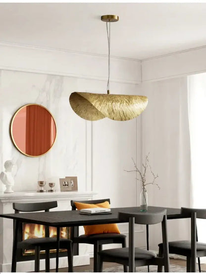 DecorBites gold lotus leaf pendant light with textured woven surface and brass-finished hardware for modern decor