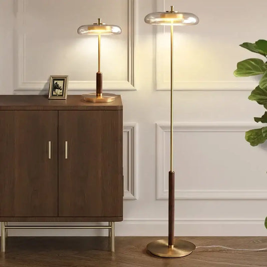 Gold-toned decorbites gold lustre mushroom table lamp with lustre glass dome shade and dark wood accent for bedroom use