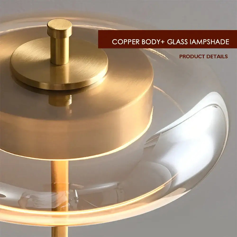 A modern decorbites gold lustre glass mushroom table lamp with brushed copper body and clear glass lampshade for bedroom wood accent