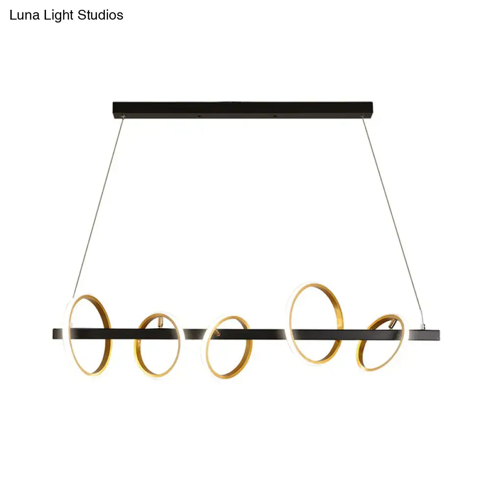 Modern black and gold metal ceiling pendant with simple circles design for dining room island lighting