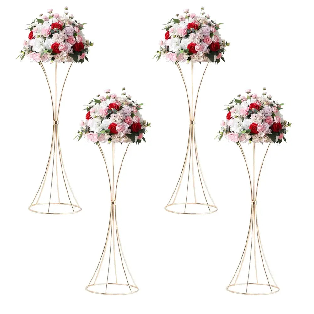 Elegant gold-toned metal trumpet flower stands holding lush artificial roses in soft pink deep red and white by decorbites