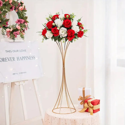 DecorBites gold metal trumpet flower stand with vibrant red and white artificial roses in a slender wire design
