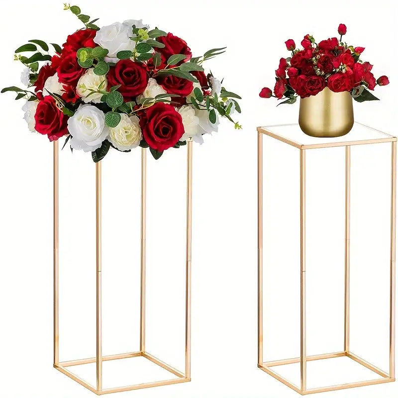 Decorbites gold metal vase set featuring gold metal floral stands with geometric design holding red and white roses