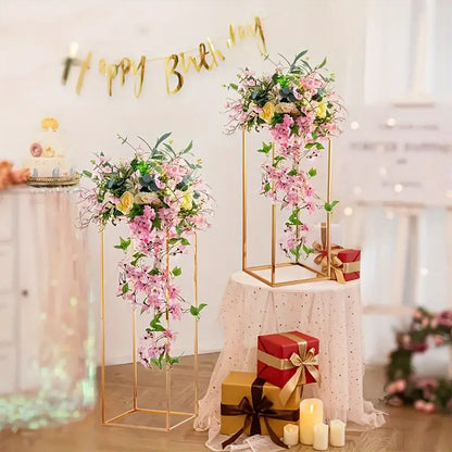 Elegant gold metal vase set by decorbites featuring floral arrangements with cascading pink and yellow artificial flowers
