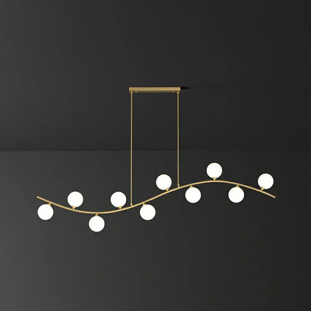 Decorbites gold milk ball glass pendant lighting with seven spherical bulbs and minimalist wavy ceiling design
