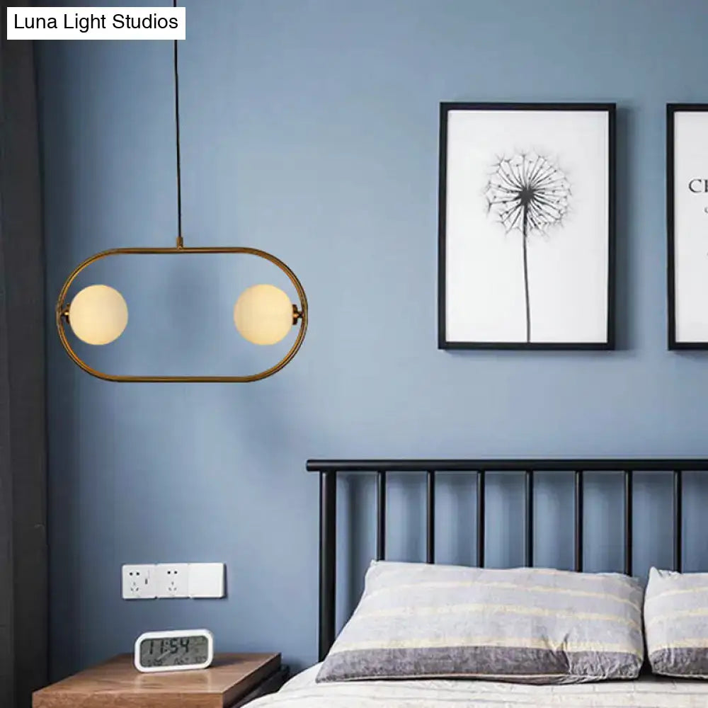Decorbites gold modern globe hanging chandelier with frosted glass globes and two bulbs for bedroom lighting