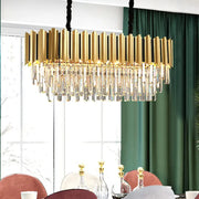 Gold-toned DecorBites™ 10-light island light with vertical crystal rod prisms for 220v-240v kitchens