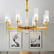 Gold plated nordic living room chandelier by decorbites with gold-toned frame, clear glass cylindrical shades, and twisted chain suspension