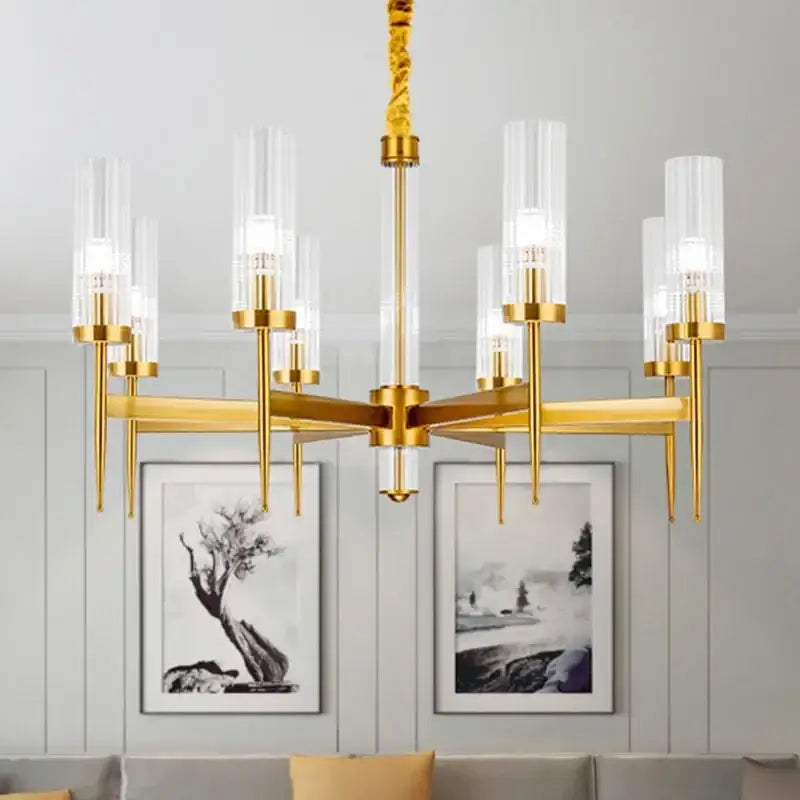 Gold plated nordic living room chandelier by decorbites with gold-toned frame, clear glass cylindrical shades, and twisted chain suspension