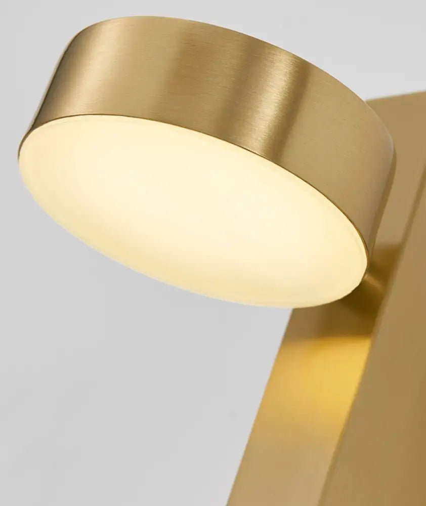Decorbites gold wall lamp with dimmer switch featuring a sleek brushed gold circular design and warm diffused light