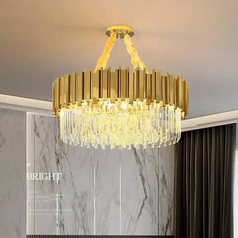 Decorbites golden luxury chandelier with gold-toned vertical metal bars and cascading crystal droplets for living room