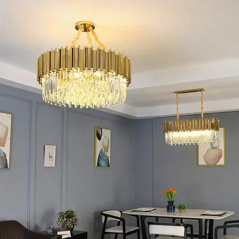 Decorbites golden luxury chandelier featuring gold-toned crystal rods and clear glass prisms for living room elegance