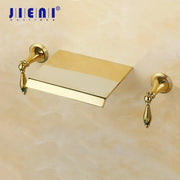 Decorbites golden plated brass toilet paper holder with ornate teardrop handles and sleek rectangular tray for bathroom use