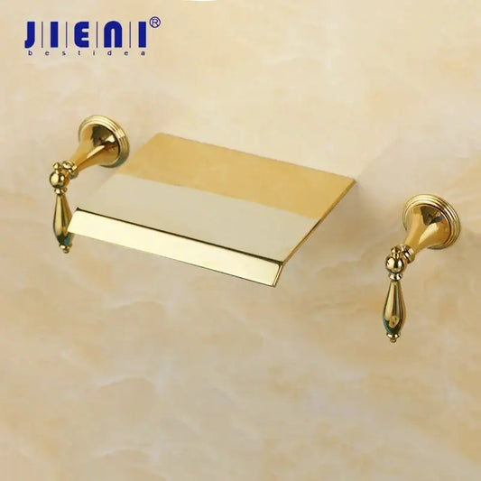Decorbites golden plated brass toilet paper holder with ornate teardrop handles and sleek rectangular tray for bathroom use