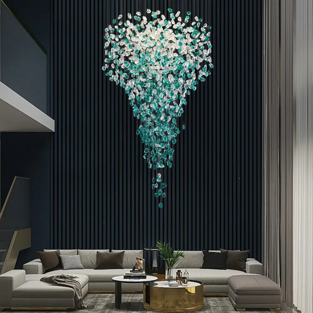 Decorbites™ green crystal stone chandelier with cascading teal and clear droplets above a modern living room