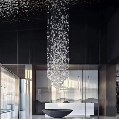 DecorBites™ green crystal stone chandelier featuring cascading clear crystal stones from a dark ceiling for modern spaces
