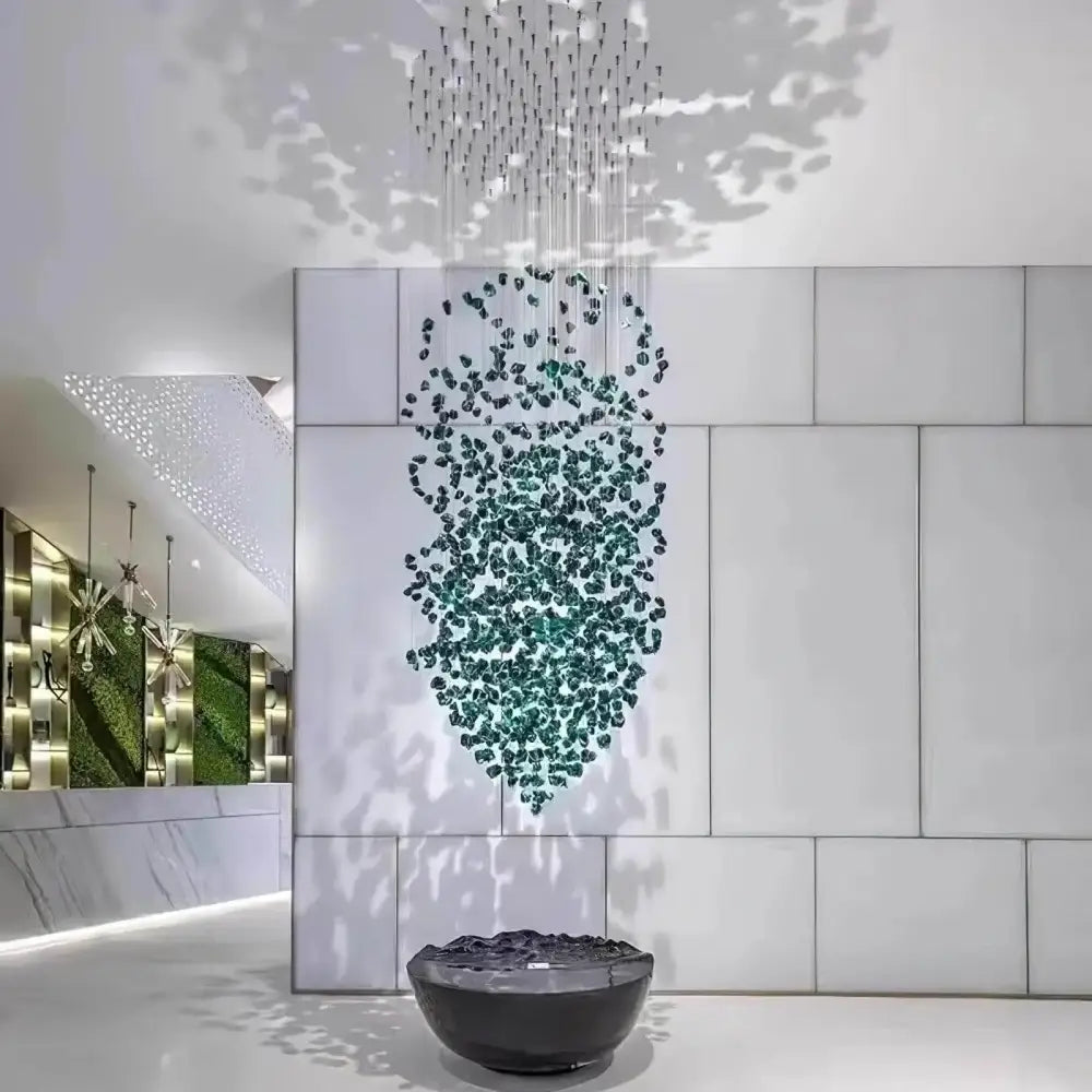 Emerald-green DecorBites™ green crystal stone chandelier suspended above a dark gray ceramic bowl for modern spaces