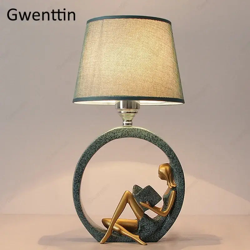 Gwenttin decorbites guitar girl table lamp with gold sculptural base teal ring and beige linen shade for reading light