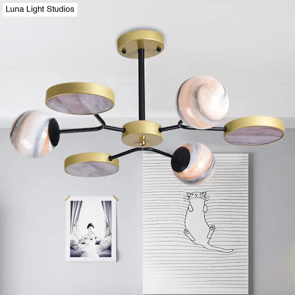 Modern chandelier with gold-toned metal arms and hand blown glass circular marble-effect shades in soft pink white and gray canopy shape compatible with 220v-240v and 110v-120v