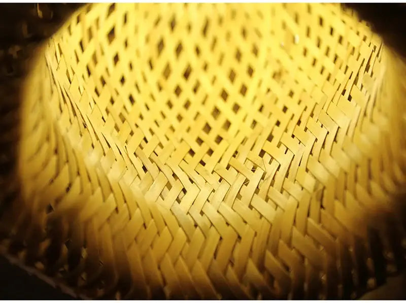 Golden woven straw decorbites™ hand-knit bamboo pendant ceiling light with diamond-patterned lattice design