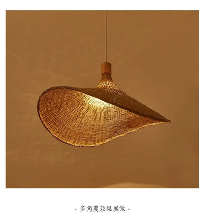 Warm-toned handwoven bamboo pendant ceiling light with flowing teardrop design by DecorBites™