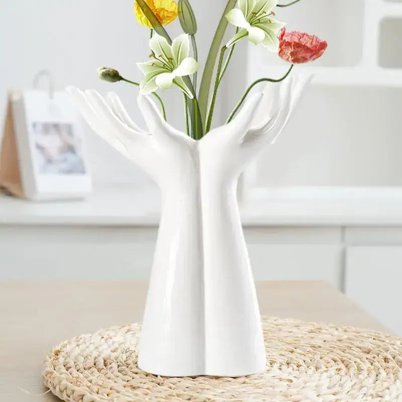 White ceramic hand shaped porcelain flower vase by DecorBites™ ideal for elegant home decor and floral display