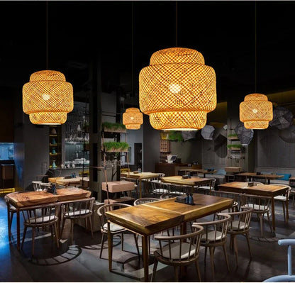 Warm tiered pendant light chandelier with hand-woven bamboo construction by decorbites hanging from ceiling