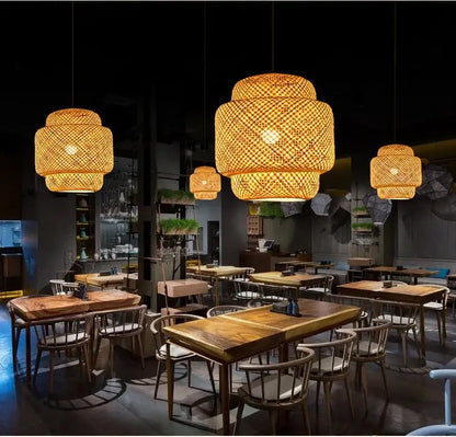 Warm tiered pendant light chandelier with hand-woven bamboo construction by decorbites hanging from ceiling