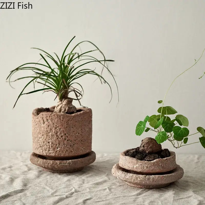 Two rustic handcrafted ceramic vases in terracotta with matching saucers for flowers by decorbites