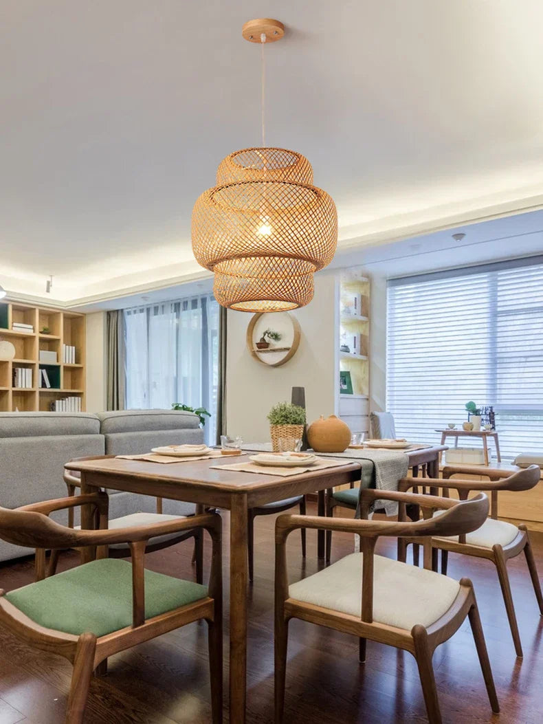 DecorBites™ handcrafted Chinese bamboo pendant lamp with tiered natural woven design and warm golden glow