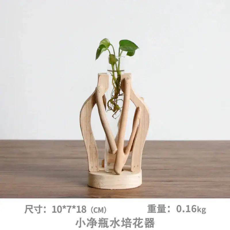 DecorBites™ handcrafted wooden vase with light natural finish holding green plant for elegant home decor