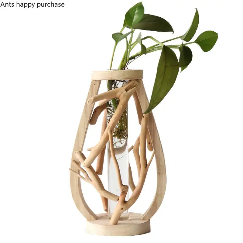 Decorbites™ handcrafted wooden vase with clear glass encased in a rustic frame for creative home decor with green foliage
