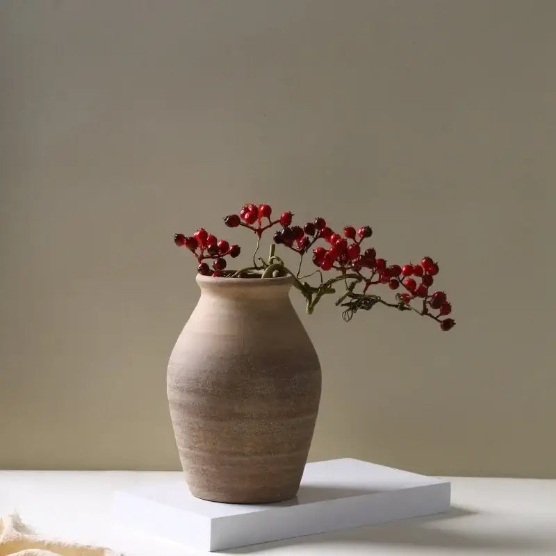 Earthenware handmade ceramic vase by decorbites with subtle ridges and warm beige finish for home decoration