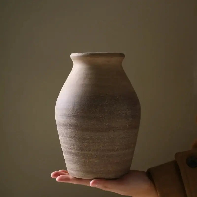 DecorBites handmade ceramic vase in rustic earth tones with subtle striations for retro style home decoration