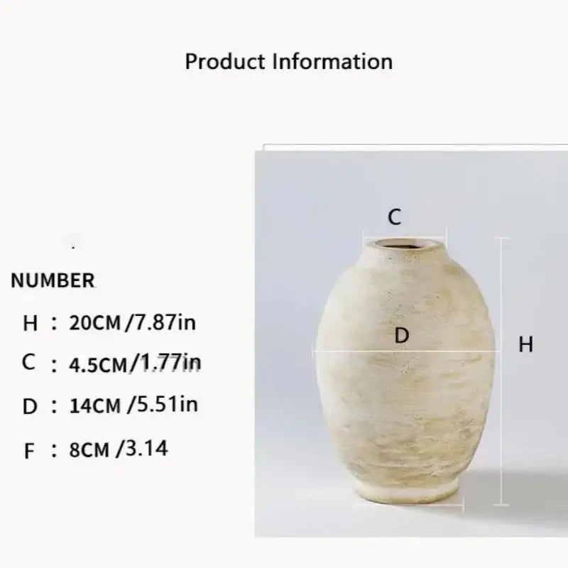 Cream-colored handmade ceramic vase with textured uneven surface and rounded body for vintage style home decor