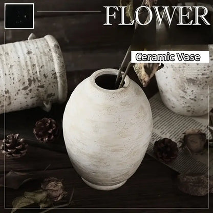 Decorbites™ handmade ceramic vases in rustic white with a textured speckled surface and rounded vintage style shape