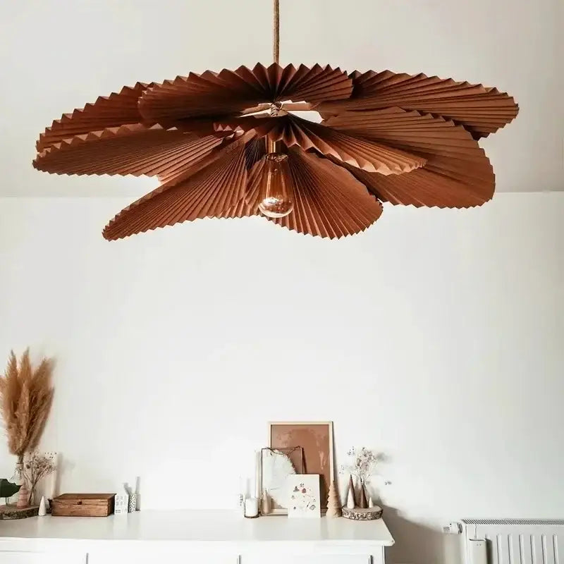 A decorbites handmade floral chandelier featuring a rustic brown wooden pendant with pleated petal-like arms