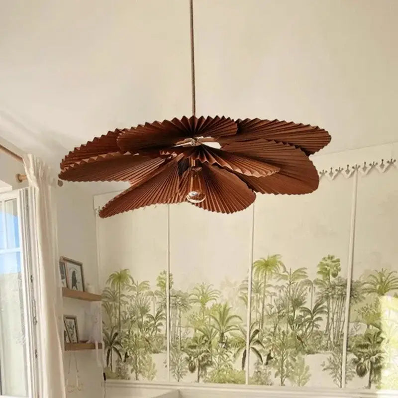 Decorbites handmade floral chandelier featuring a brown wooden ceiling fan with tropical leaf design and exposed bulb