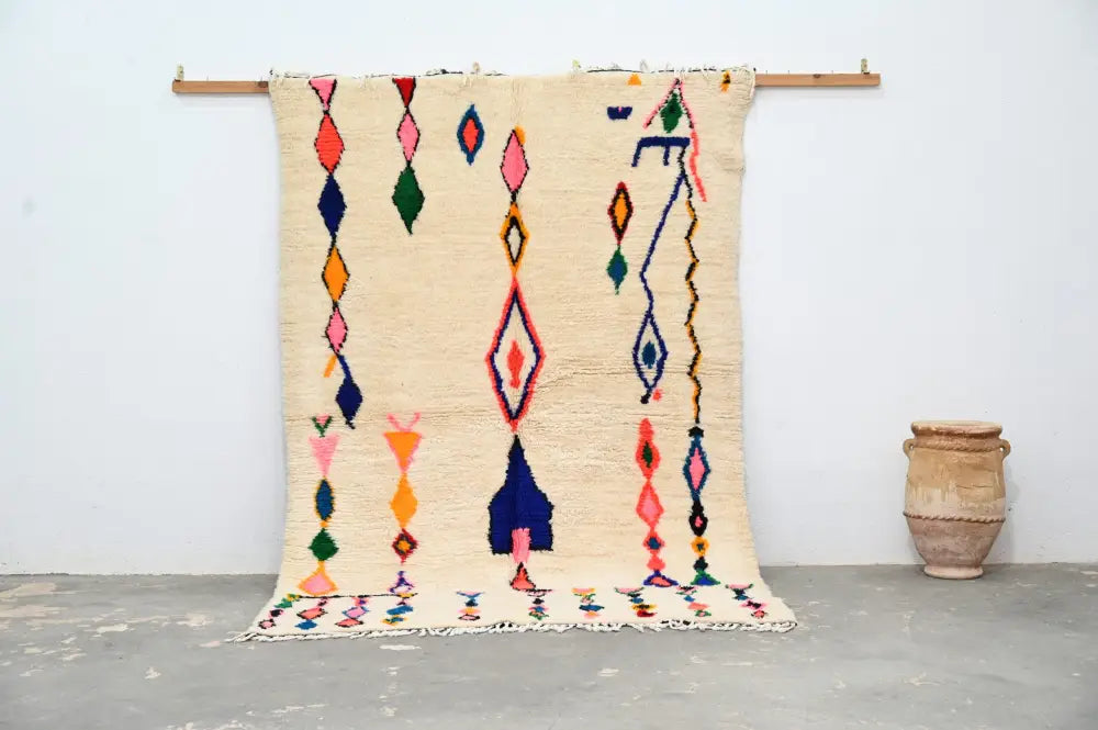 Beige DecorBites™ handmade moroccan azilal carpet with vibrant pink blue green and orange geometric patterns 240x160 cm