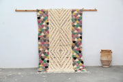 Colorful handwoven DecorBites™ handmade Moroccan azilal rug 222x133 cm with cream geometric pattern and vibrant polka dots