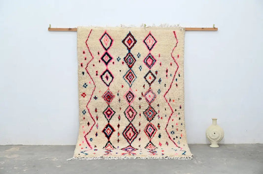 Beige handmade traditional azilal rug with pink red and navy blue geometric diamond and zigzag patterns 230x154cm