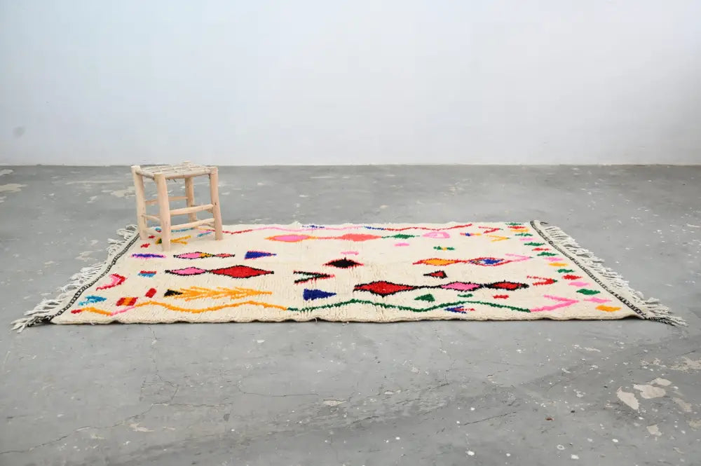 DecorBites handmade moroccan azilal rug in cream with colorful geometric patterns made of natural wool 231x131cm