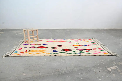 DecorBites handmade moroccan azilal rug in cream with colorful geometric patterns made of natural wool 231x131cm