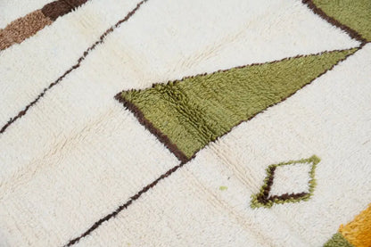 A plush cream-colored decorbites™ handmade traditional azilal rug with olive green and brown geometric patterns 237x146 cm