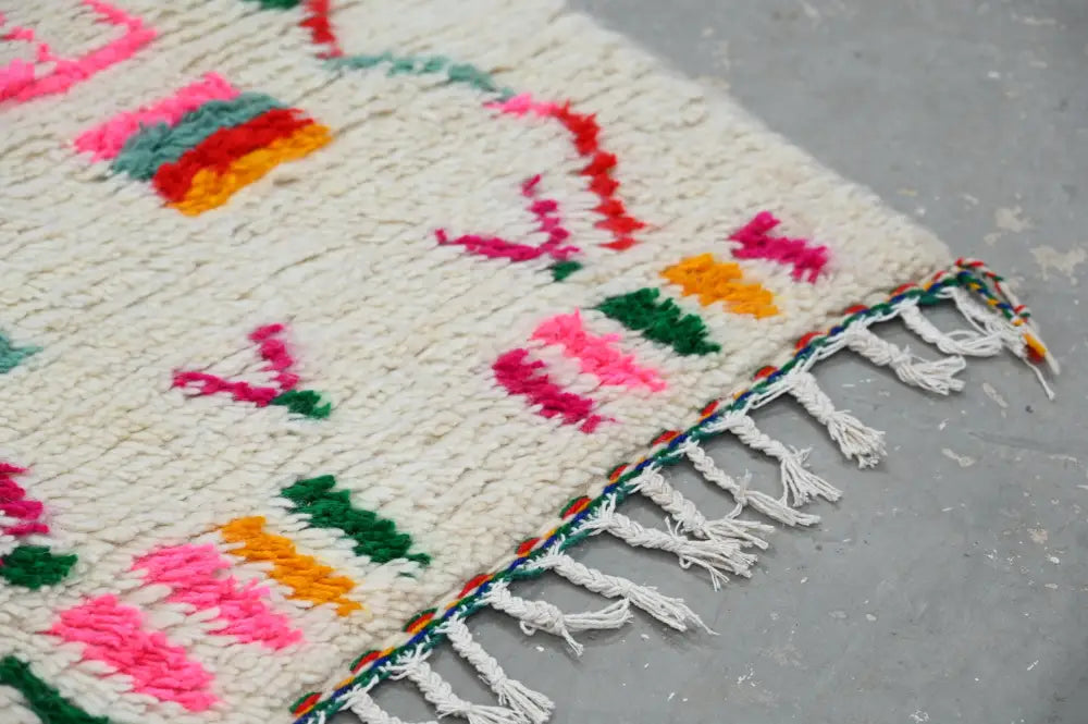 DecorBites™ handmade traditional azilal rug 240x141 cm with cream base and bold pink green orange geometric patterns