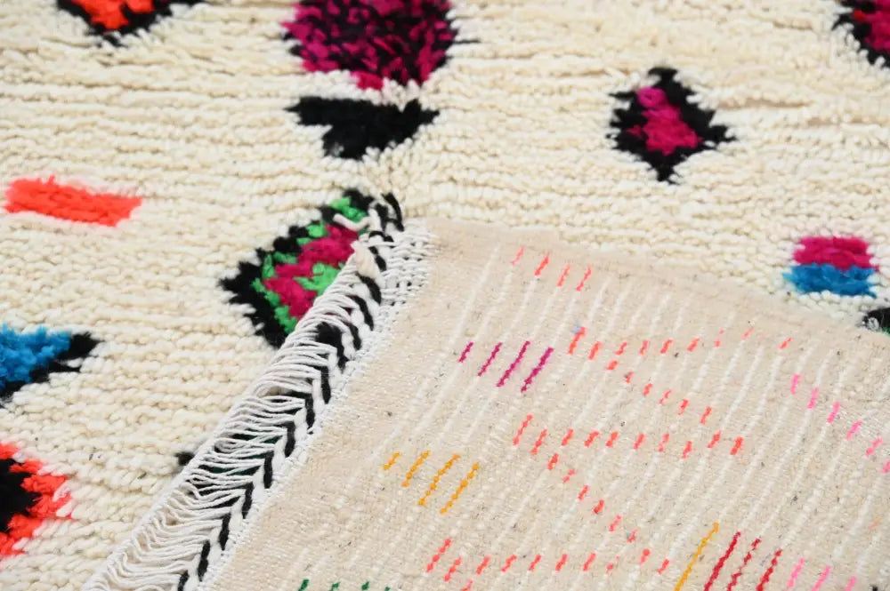 Beige DecorBites™ handmade Moroccan azilal rug 240x144cm with colorful geometric patterns in pink black red blue and green