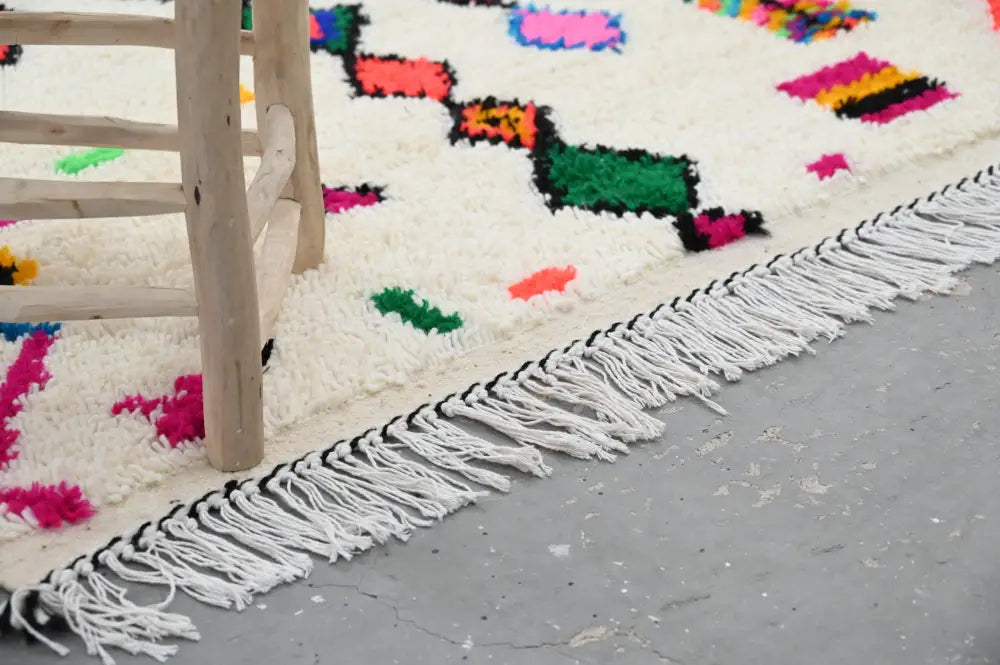 DecorBites™ handmade cream azilal rug 240x144cm with vibrant pink green orange geometric patterns and white fringe