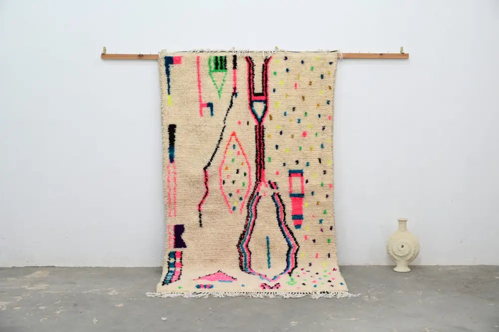Beige woven decorbites™ handmade traditional azilal rug with colorful pink green blue and black geometric patterns 241x140 cm