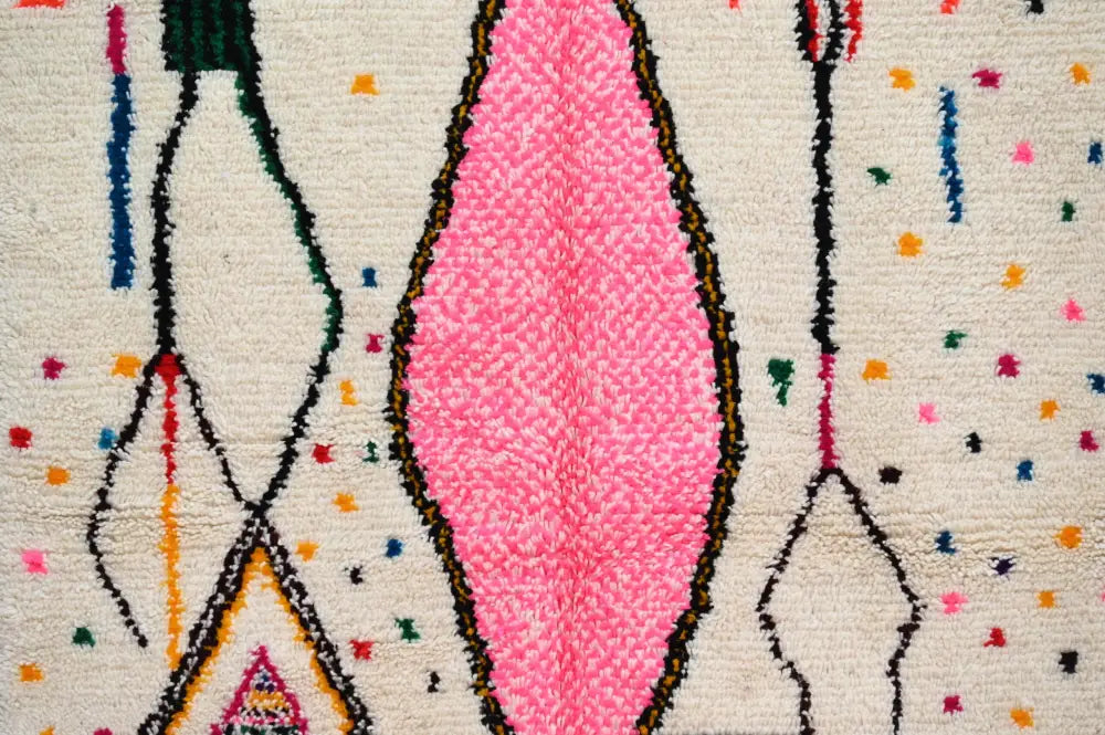 Decorbites™ handmade moroccan azilal rug with vibrant pink diamond woven pattern and colorful geometric accents on cream