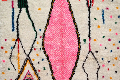Decorbites™ handmade moroccan azilal rug with vibrant pink diamond woven pattern and colorful geometric accents on cream
